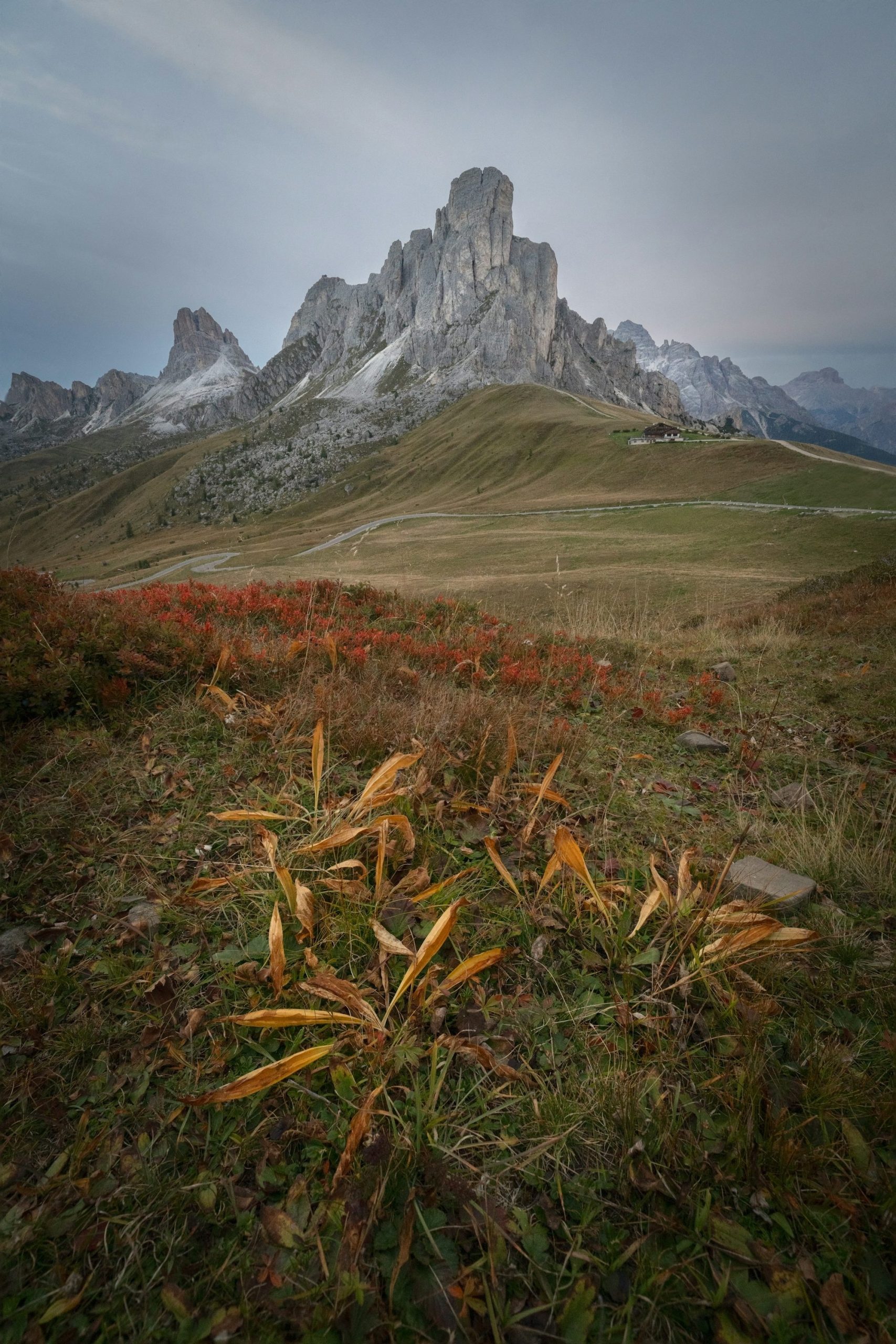 Rugged Mountain Peaks Under A Cloudy Sky