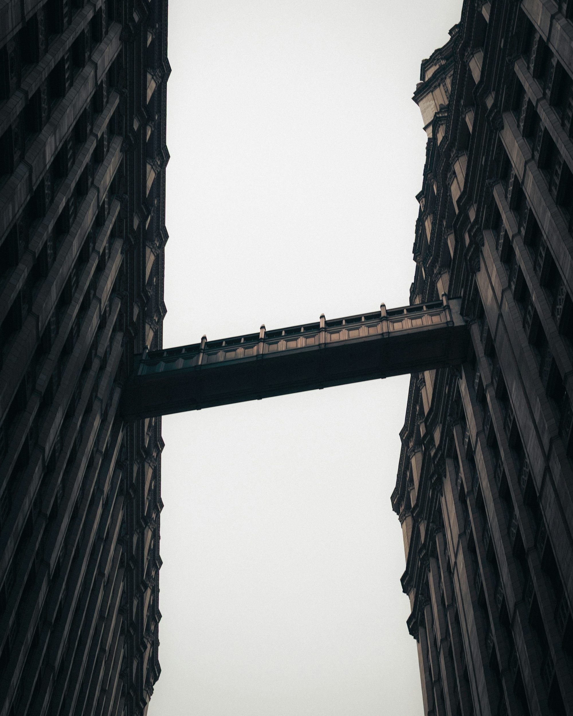 Two Imposing Buildings Connected By A Skybridge
