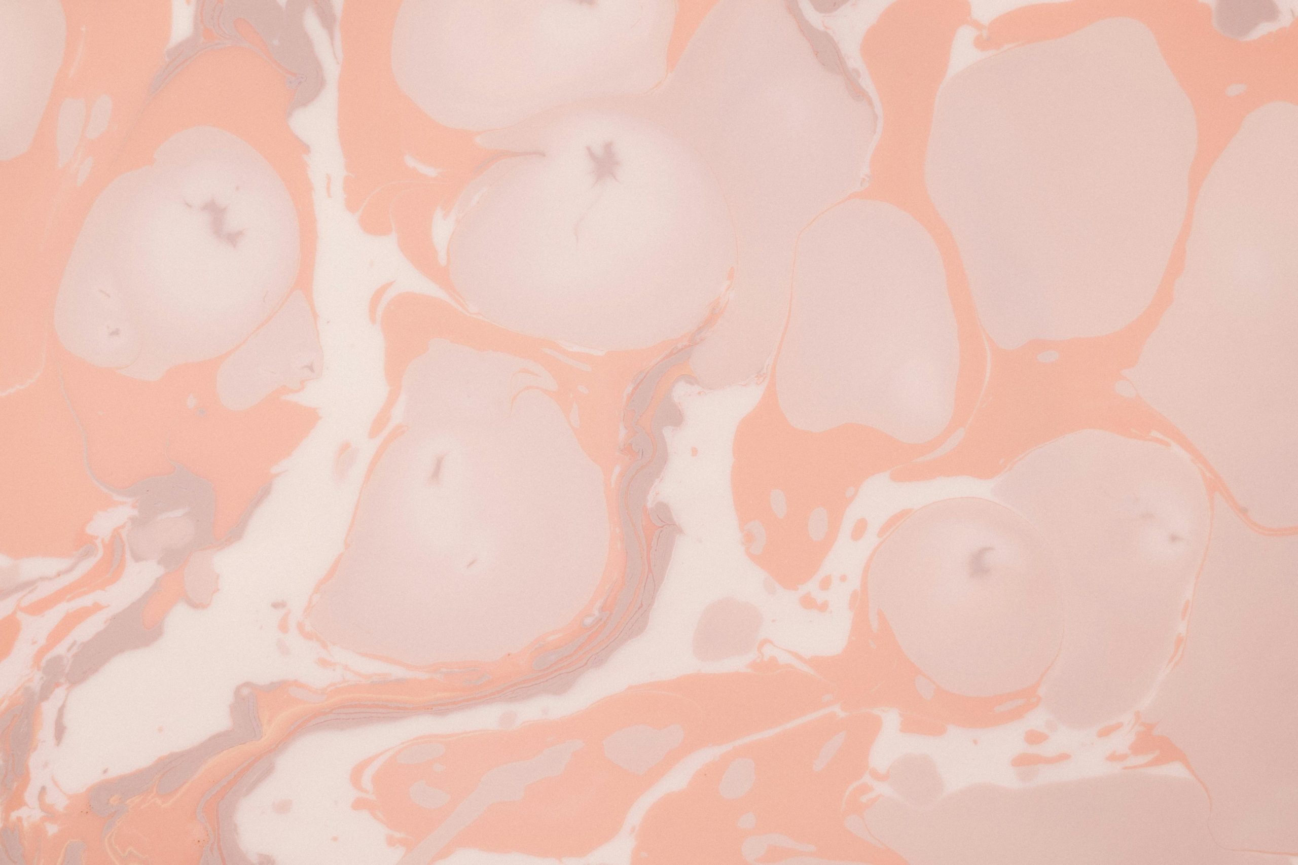 Abstract pattern of pink and white swirls