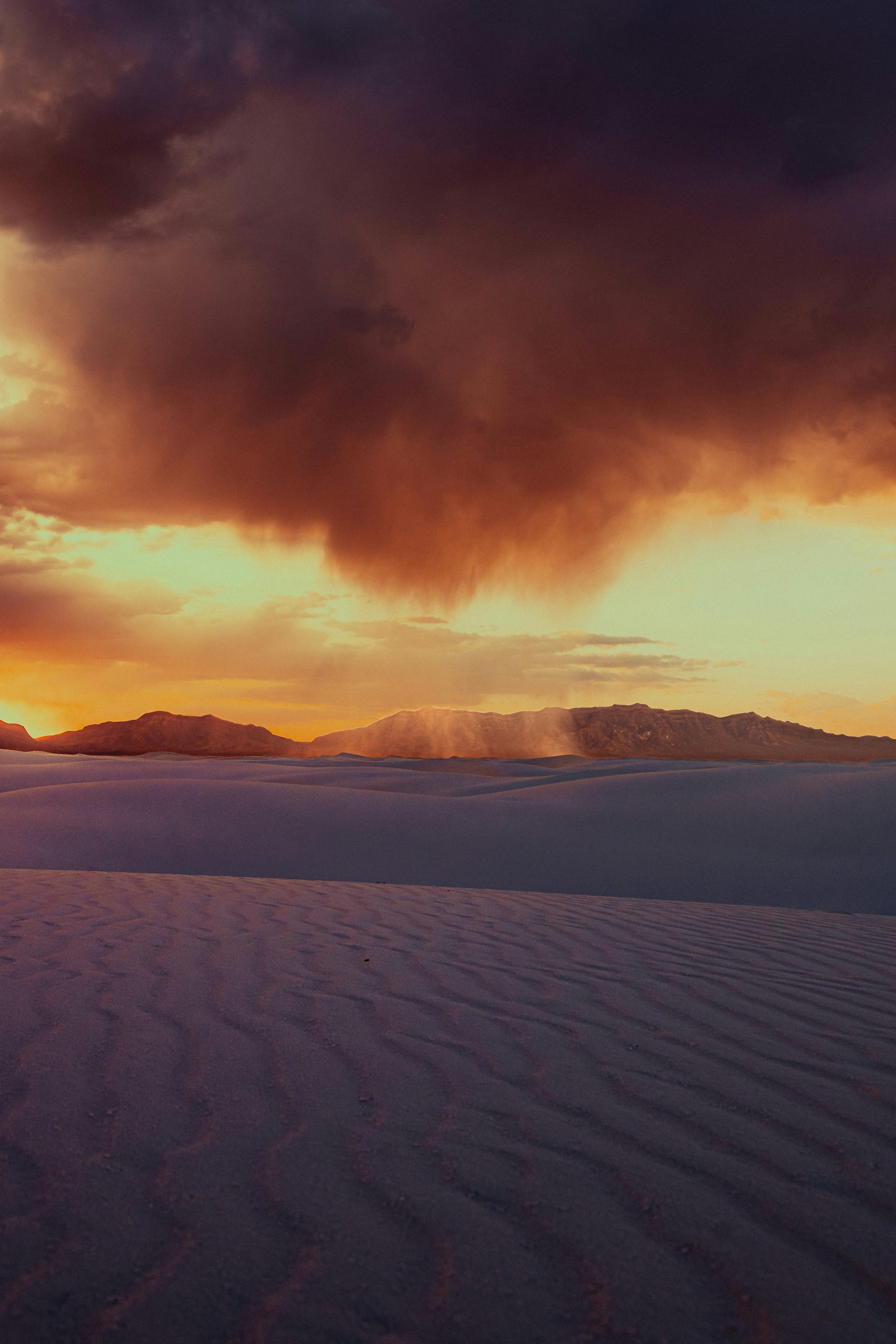 Dramatic sunset over a vast desert landscape