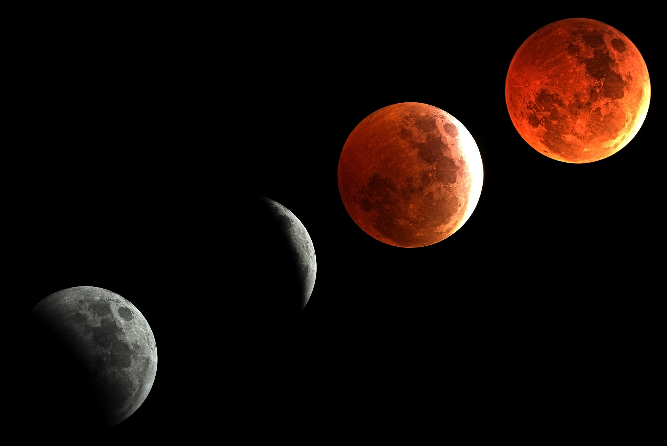 Phases of a lunar eclipse against a black sky