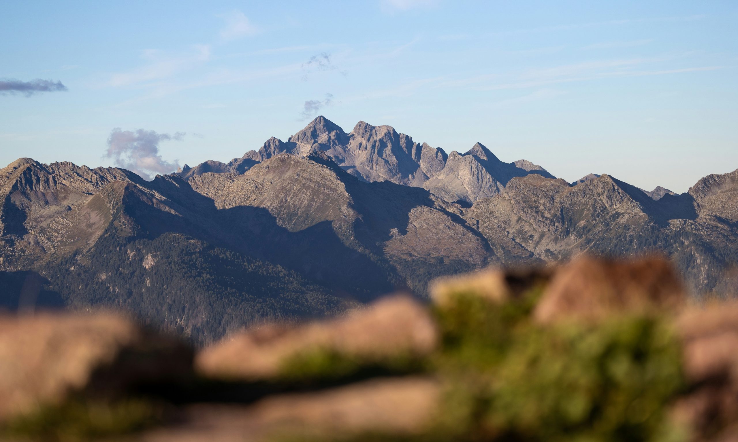 Jagged mountain peaks under a clear blue sky