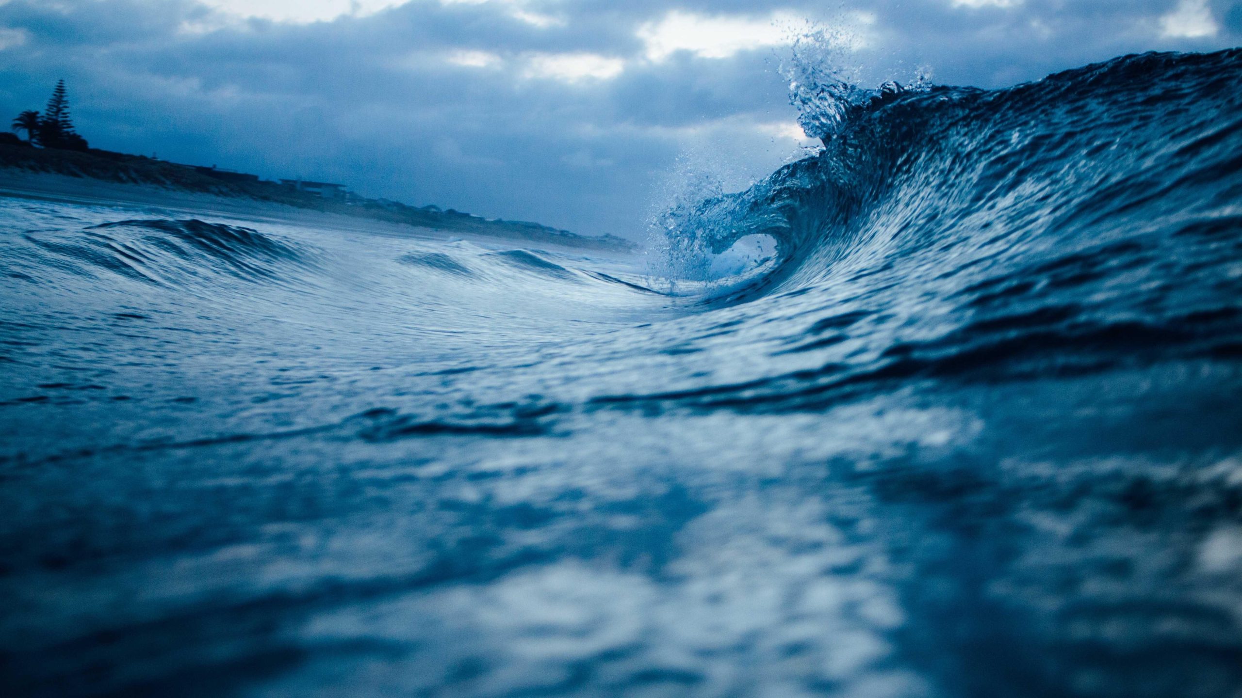 Blue underwater scene with sunlight penetrating the ocean depths