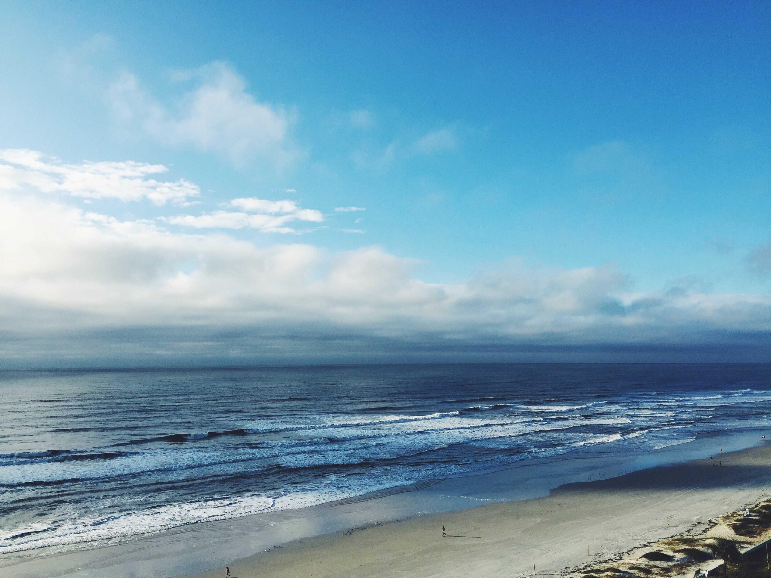 Tranquil seascape with deep blue waters meeting the horizon