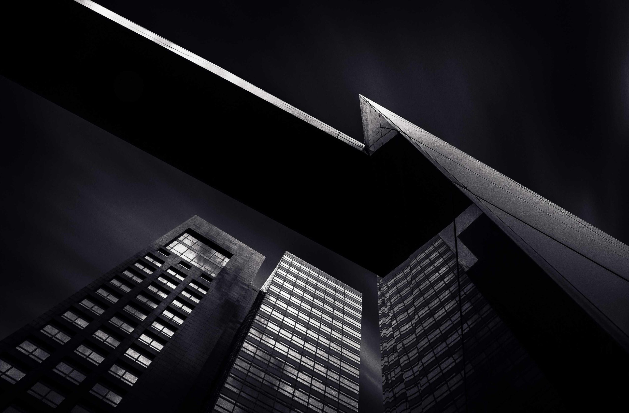 Night sky filled with stars above a silhouetted mountain range