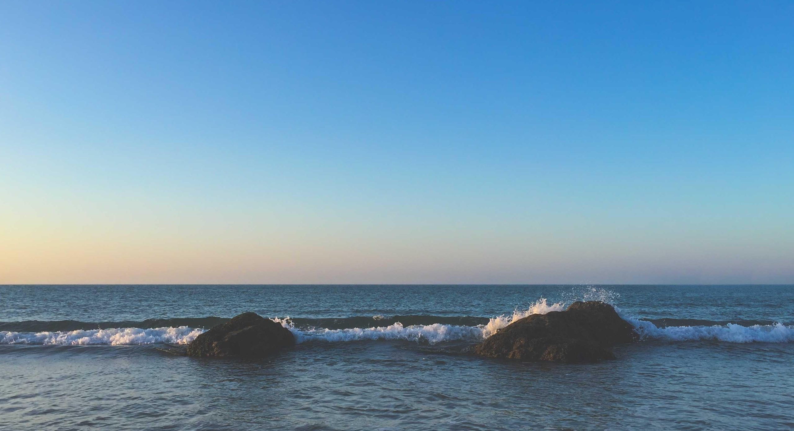 Soft pastel blue gradient creating a calming minimalist atmosphere
