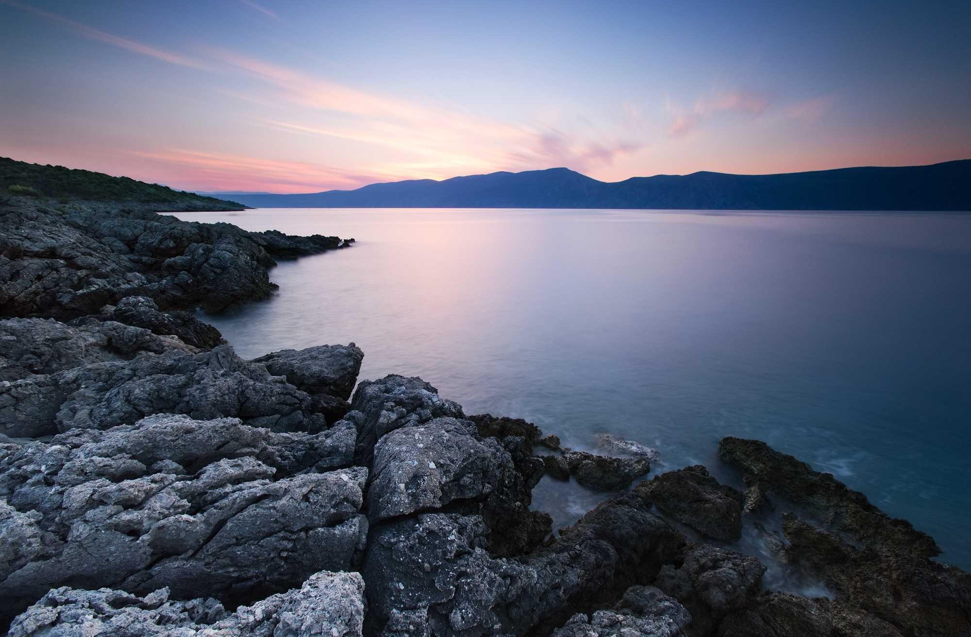 Brilliant cobalt blue ocean stretching endlessly toward the horizon
