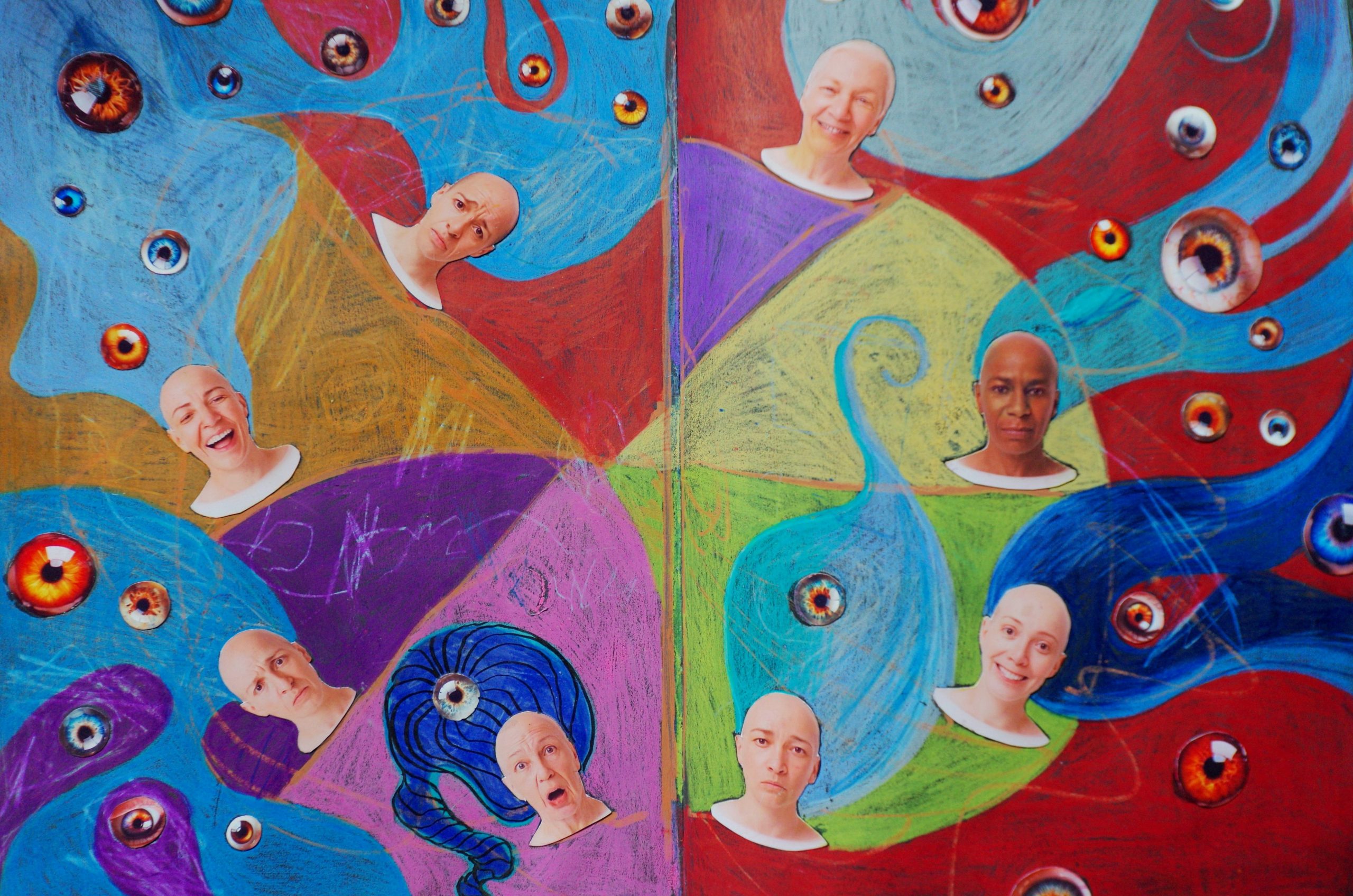 Abstract art with floating heads and eyes