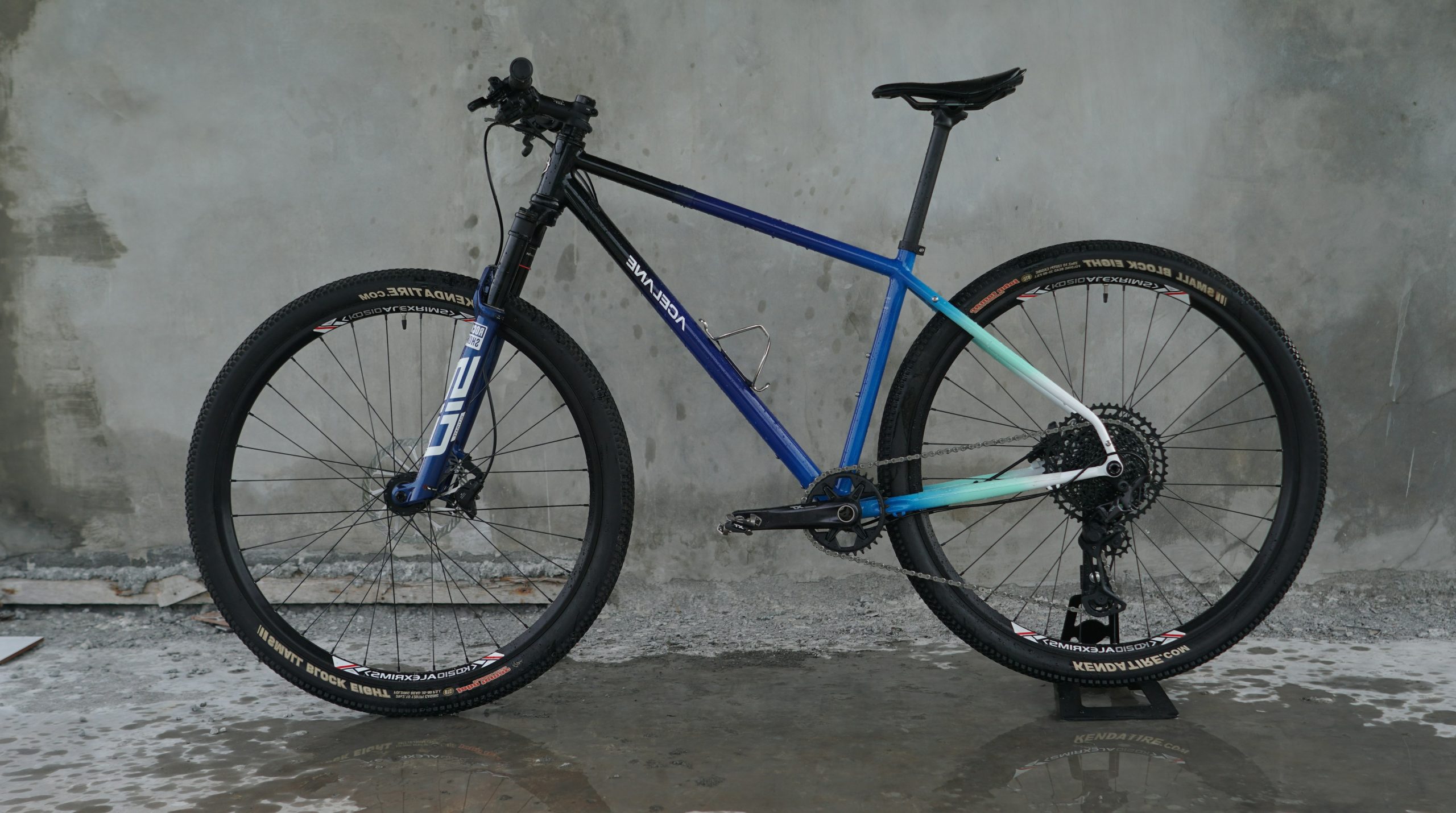 A modern mountain bike with a gradient frame.