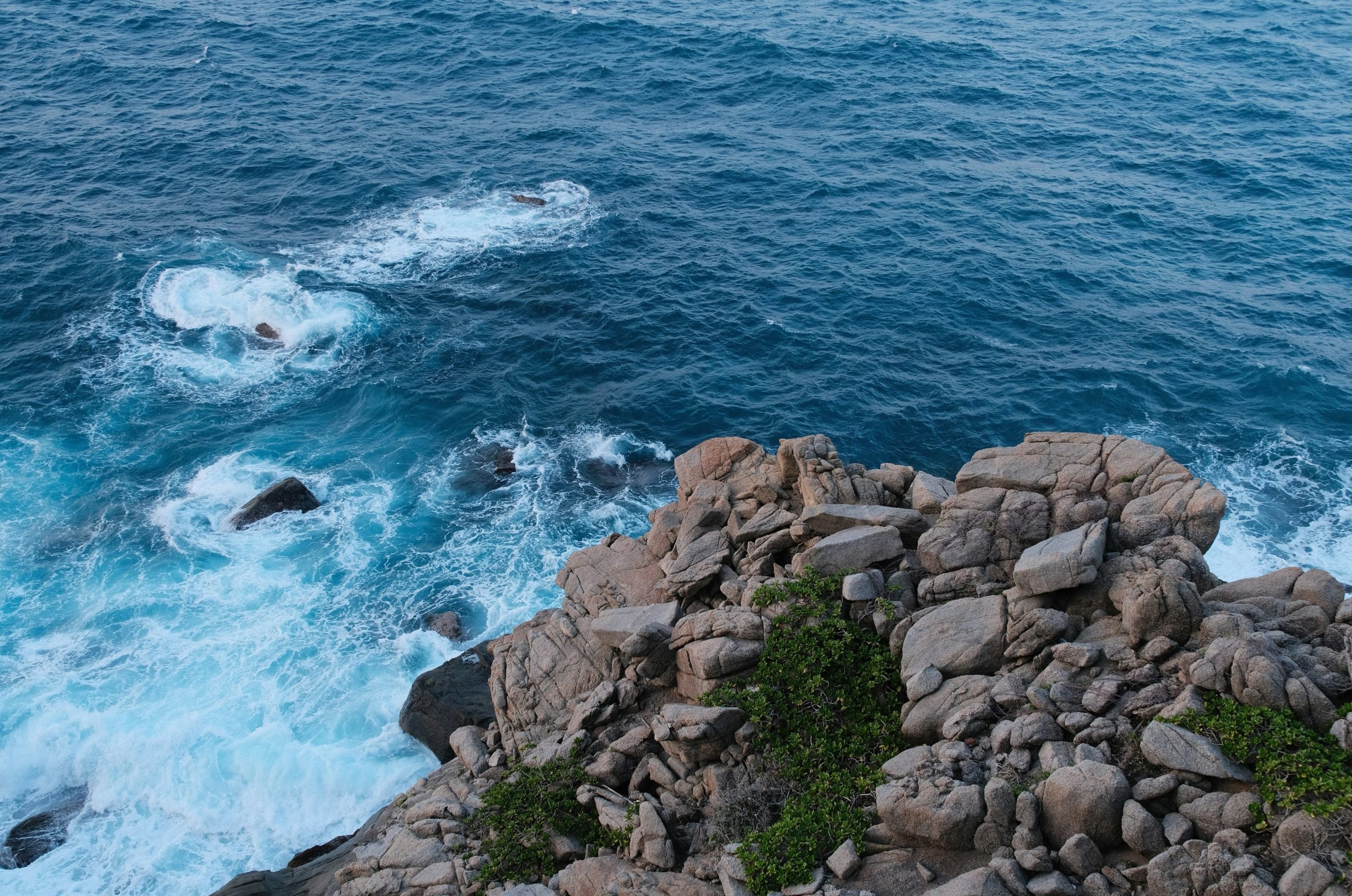 Rocky coastline with waves crashing on shore
