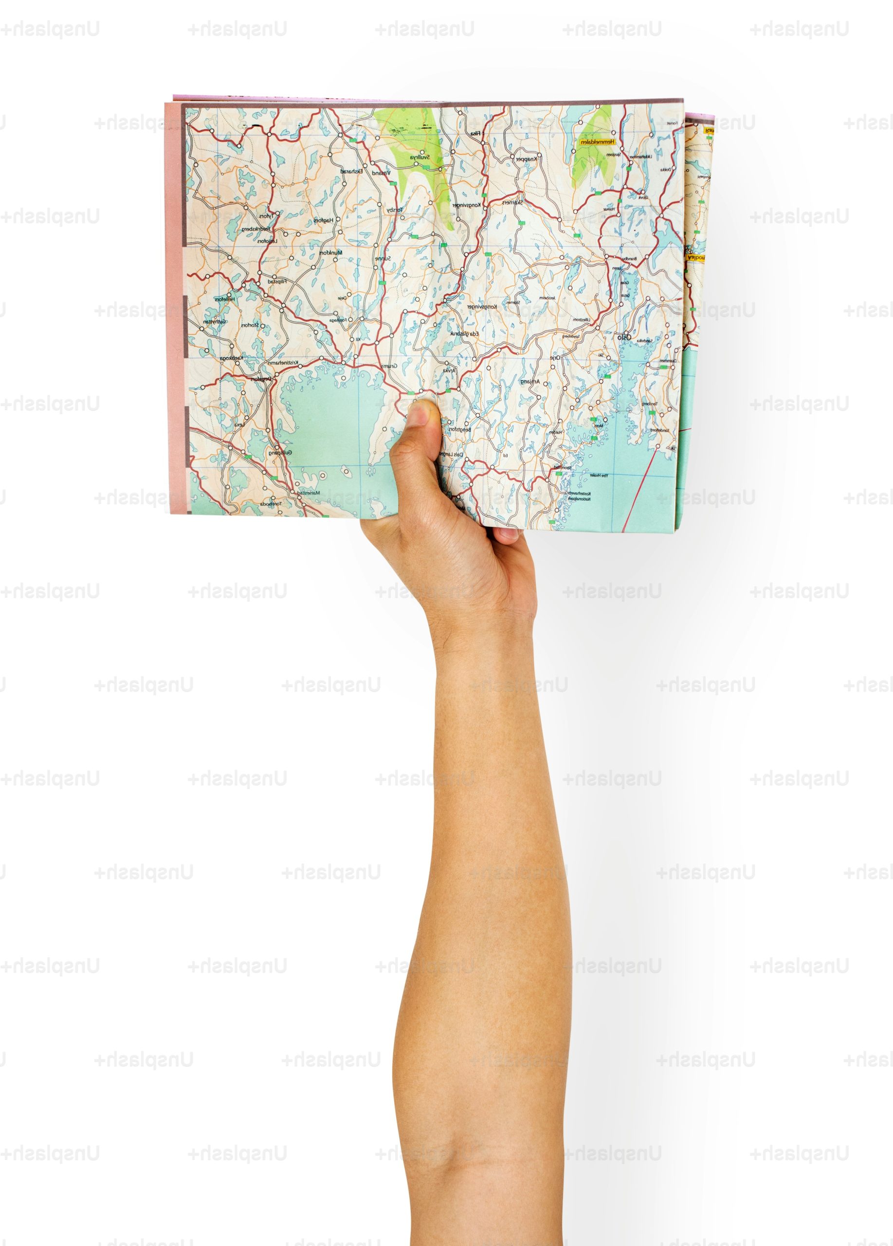 Hand holding world map on white background