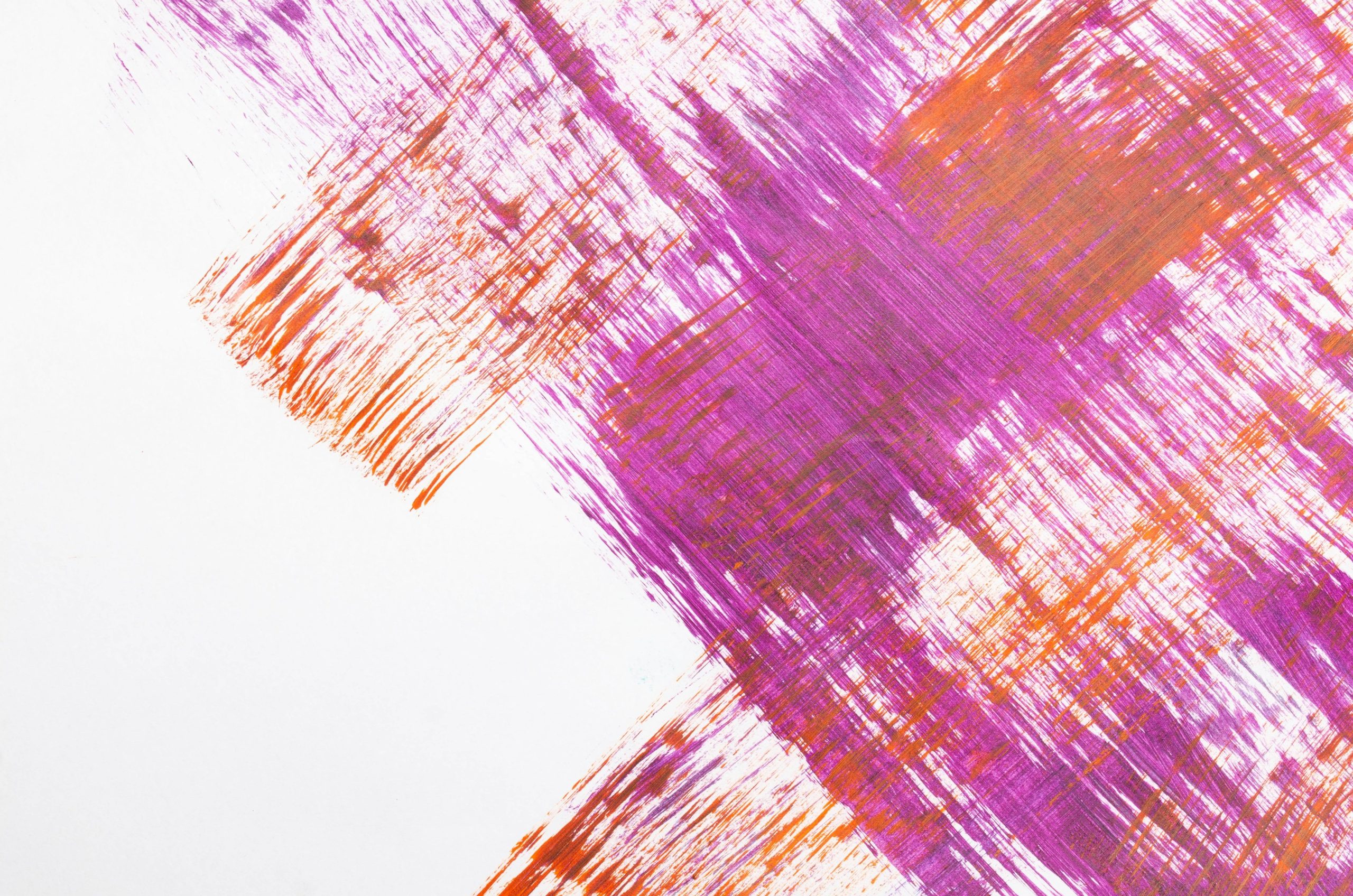 Abstract brush strokes in pink and orange on white.