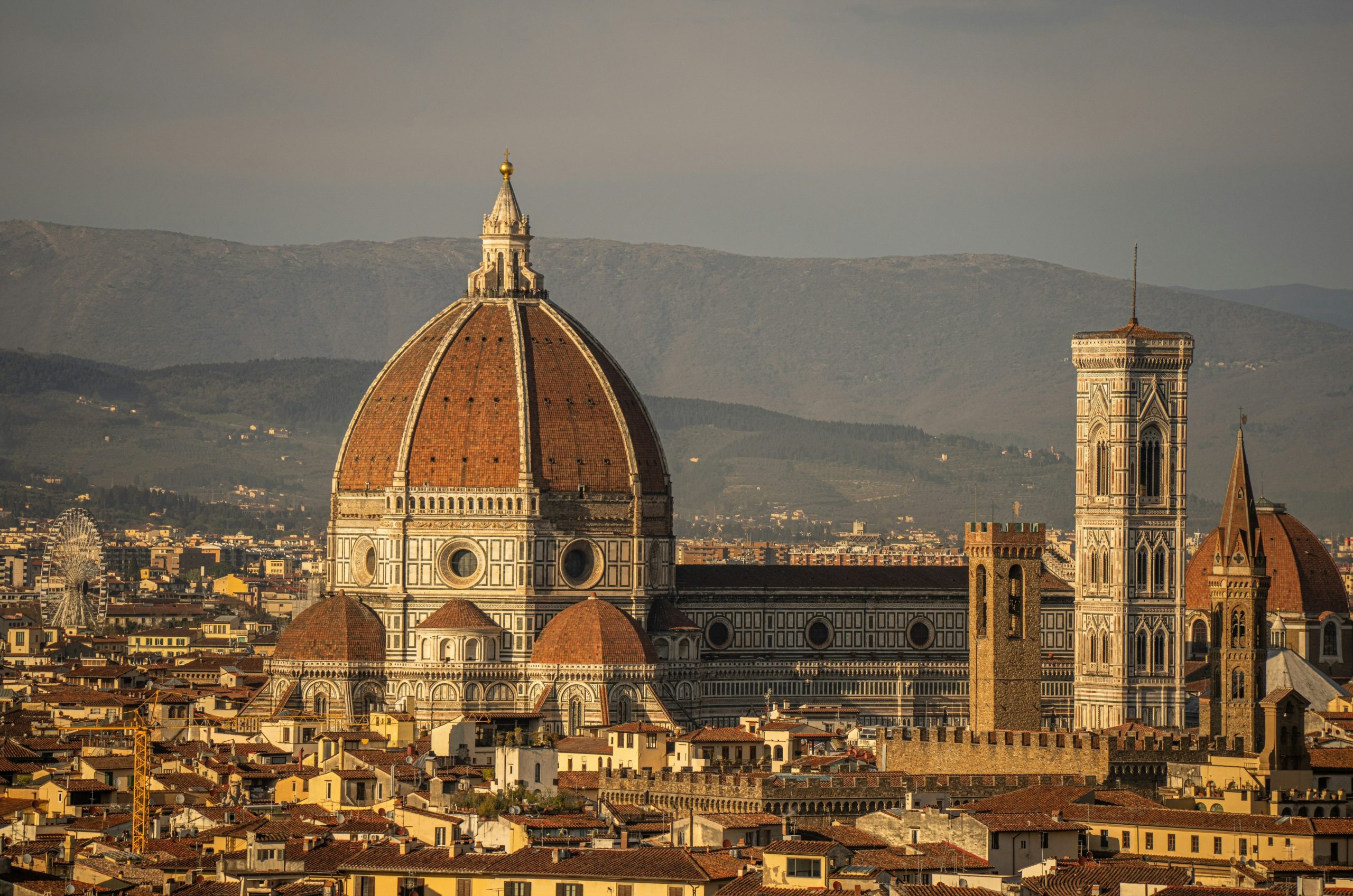 Florence cathedral dome and giotto's campanile at sunset