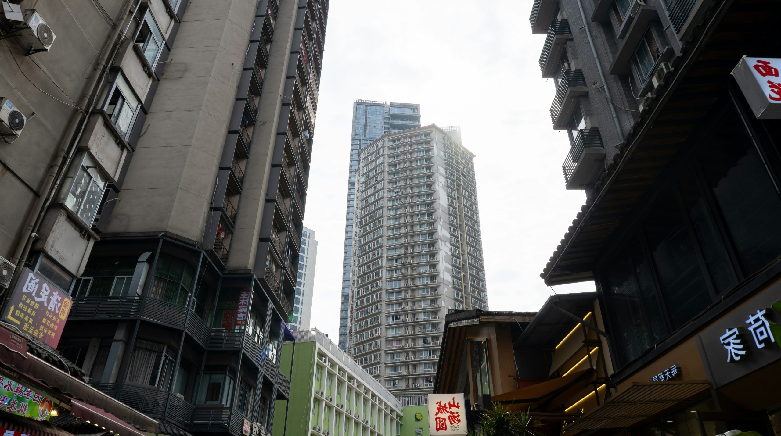 Tall modern buildings rise above city street