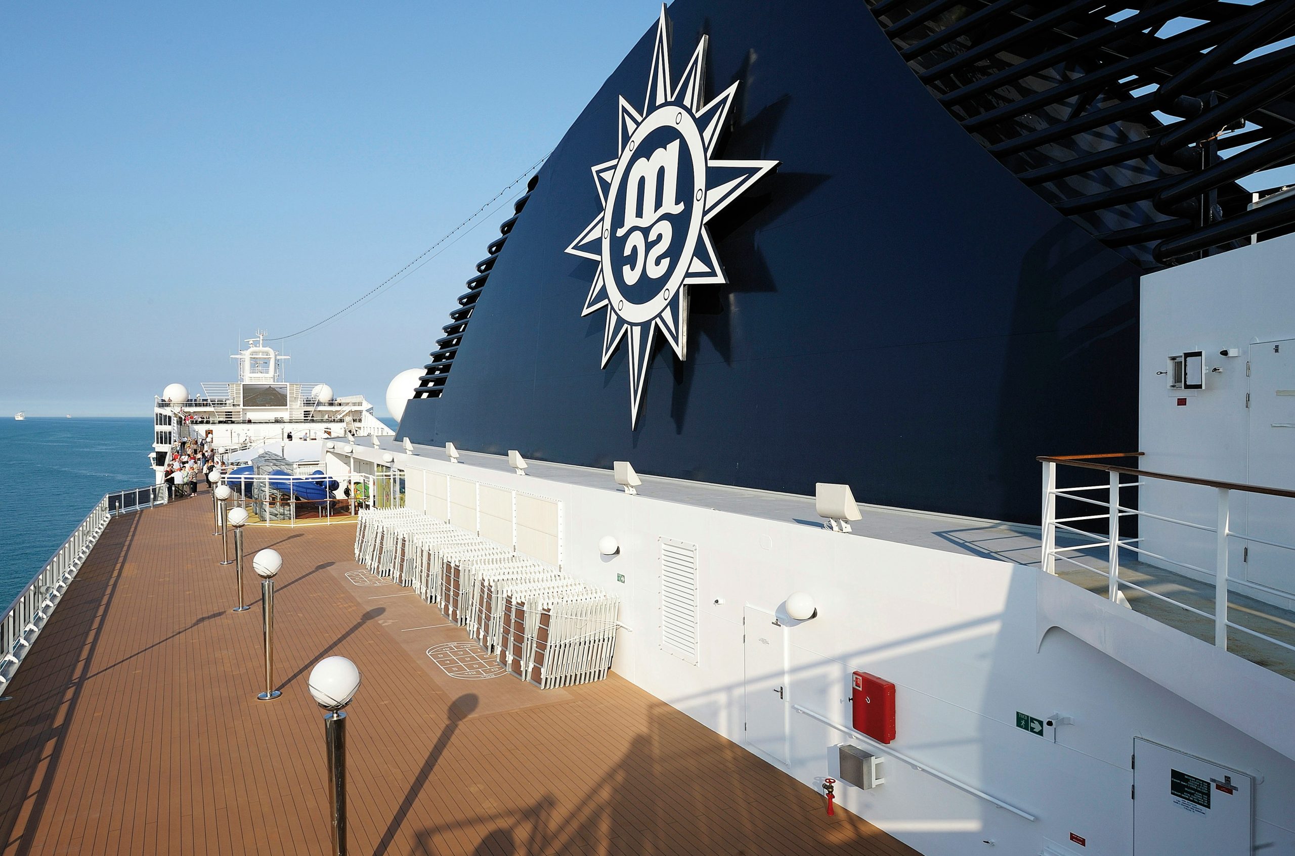 Large msc cruise ship funnel and deck with ocean view.
