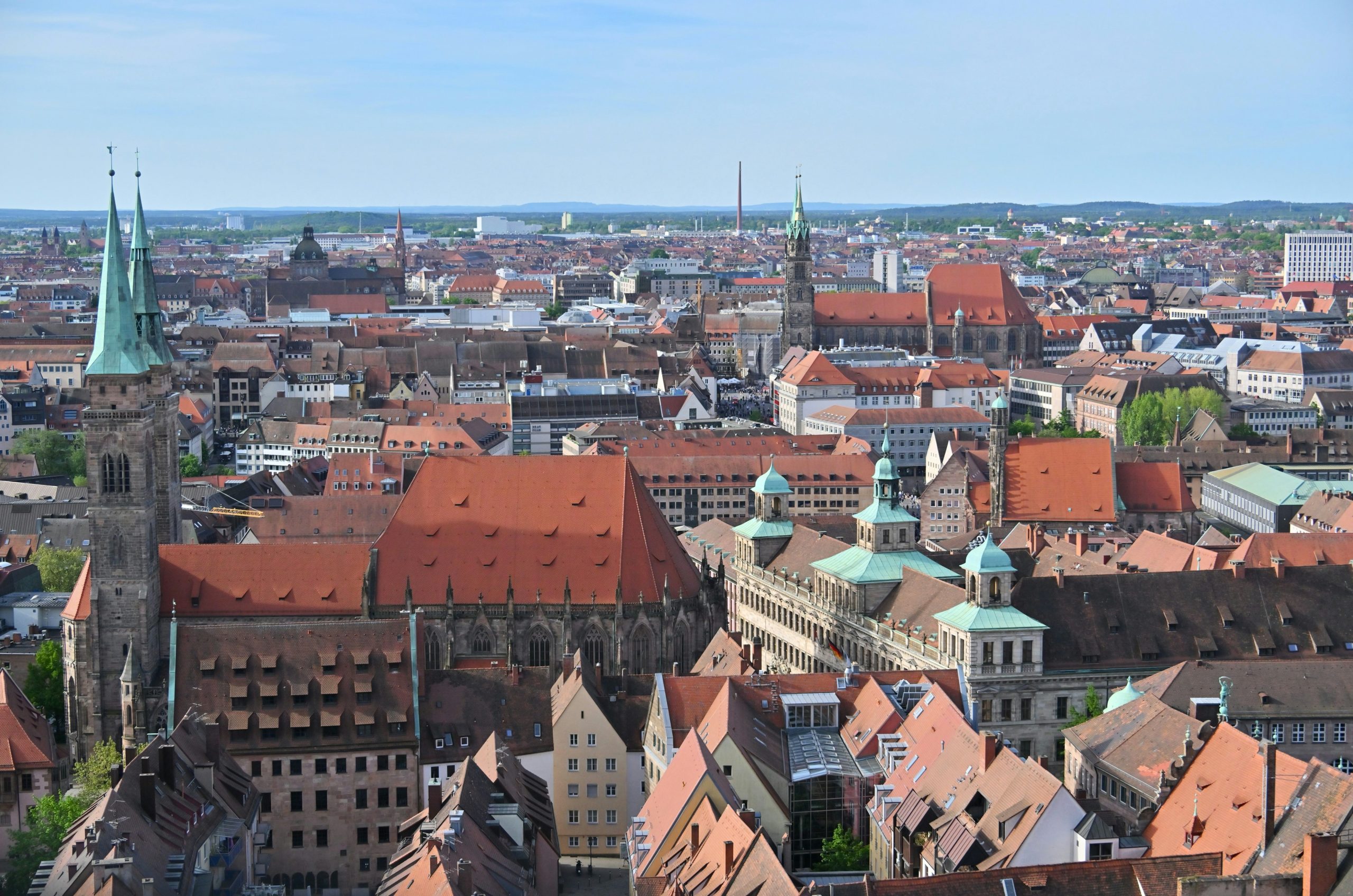 Rooftops of a historic european city under a clear sky