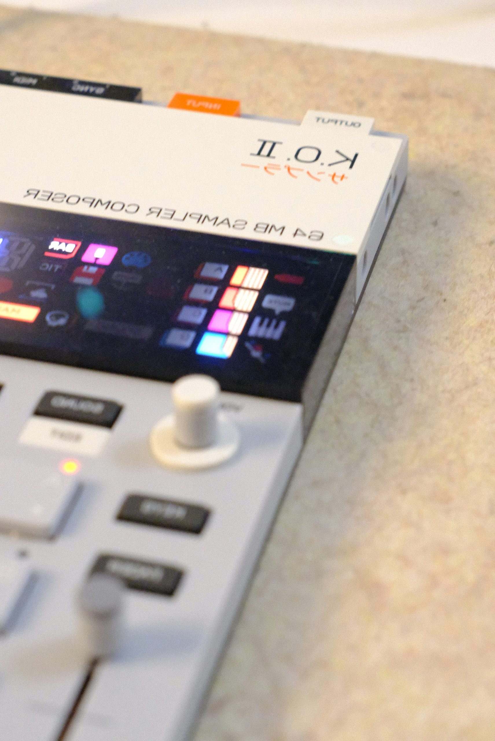 White k.o. ii sampler composer with colorful screen and controls.