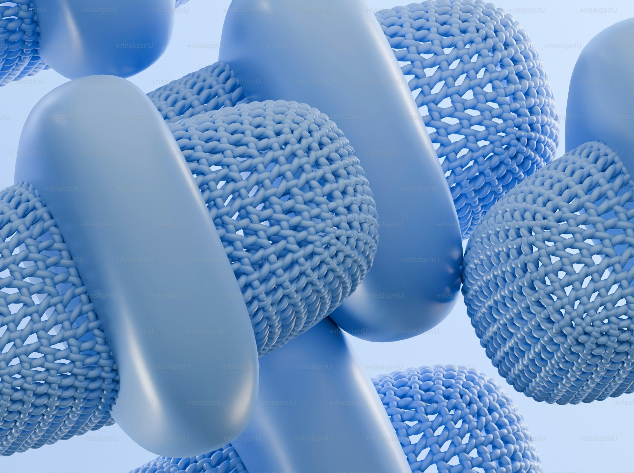 Abstract blue spheres and smooth pill shapes with a woven fabric texture.