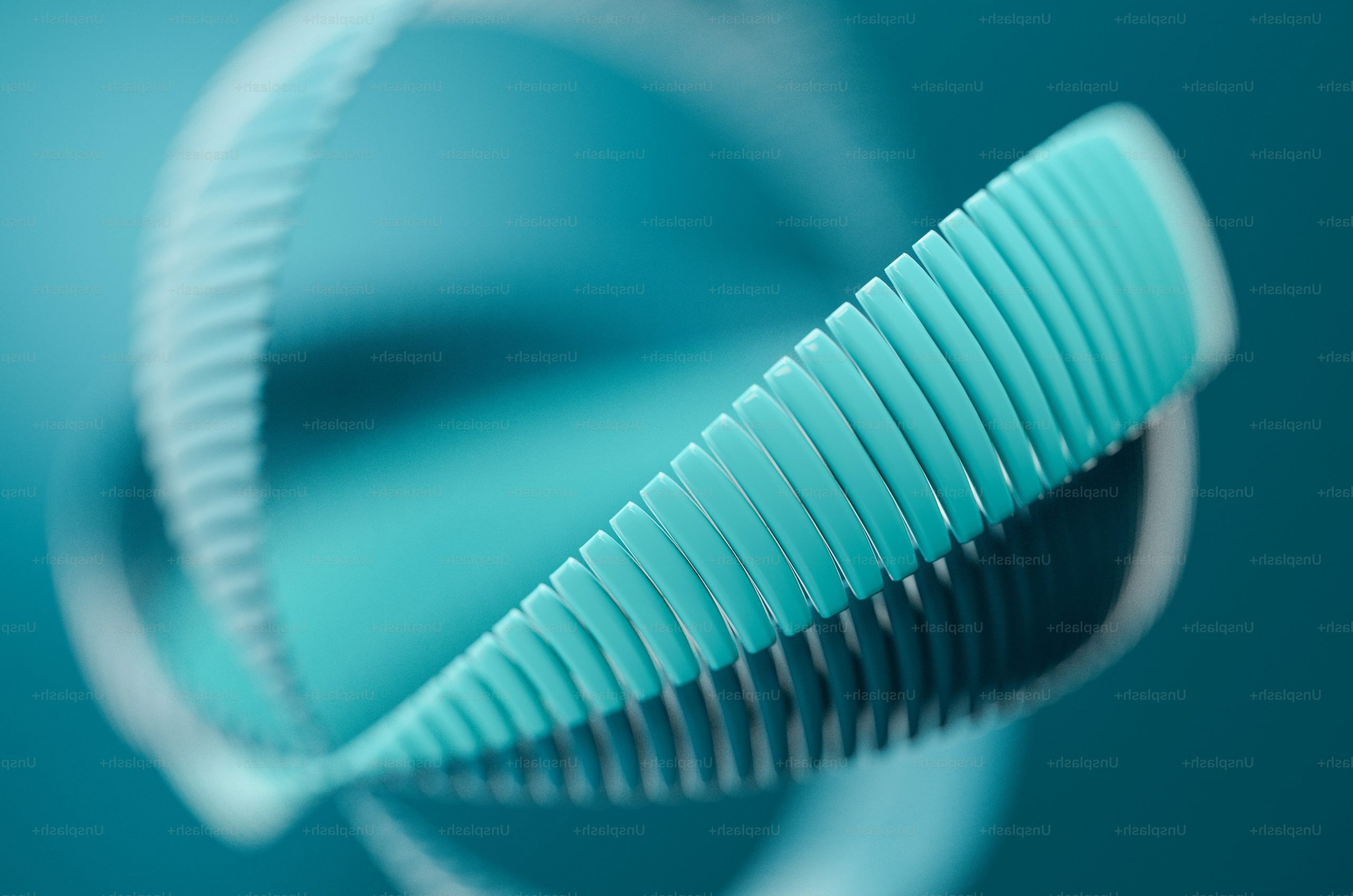 A teal spiral structure with repeating segments against a matching teal background.