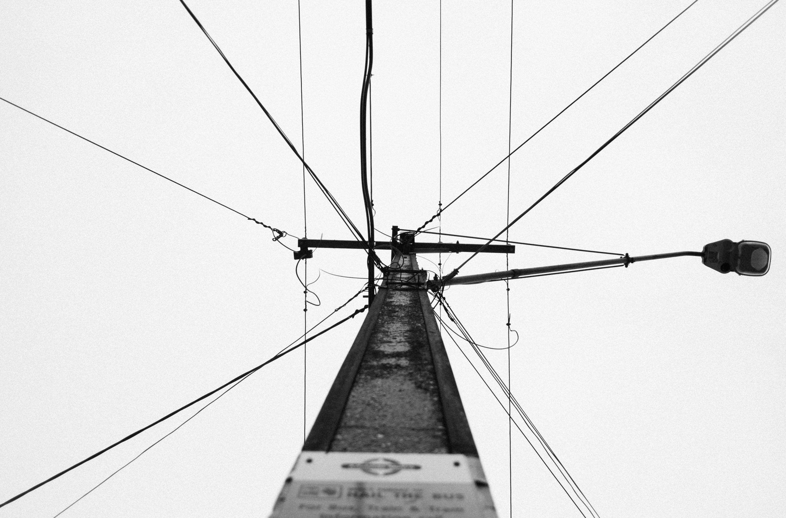 grayscale photo of cable wire