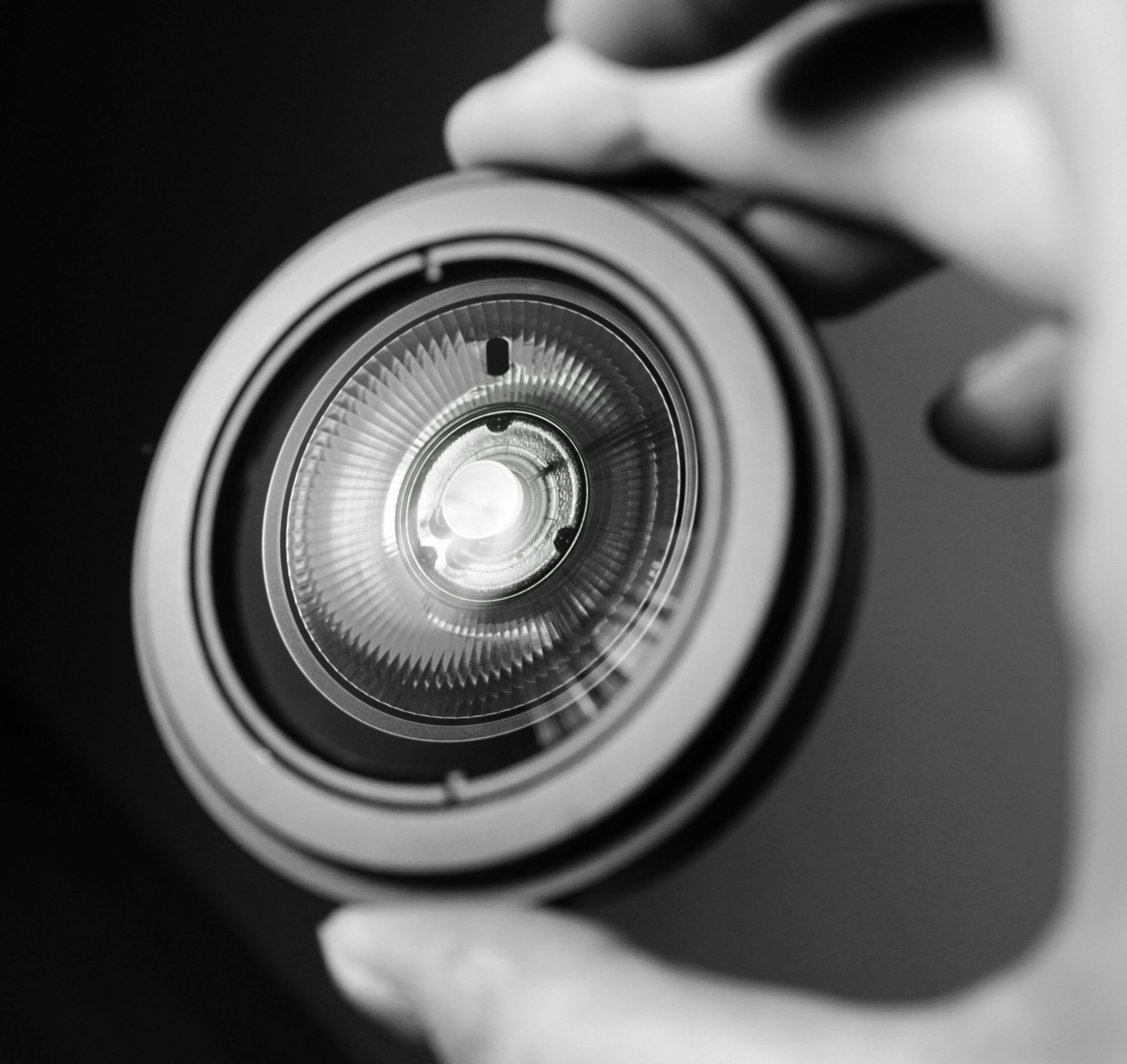 grayscale photo of round metal