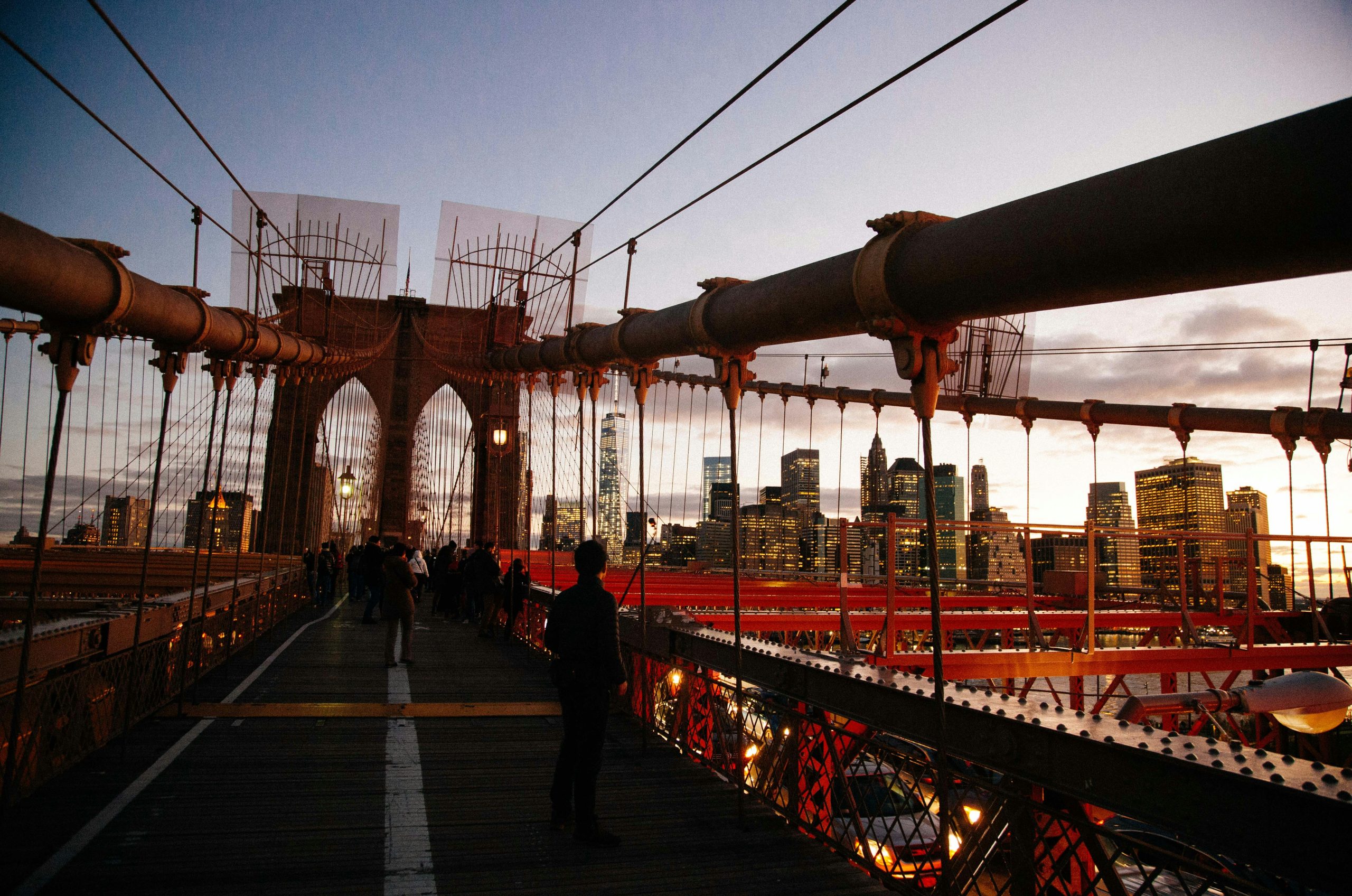 people standing on Brooklyn Bridge