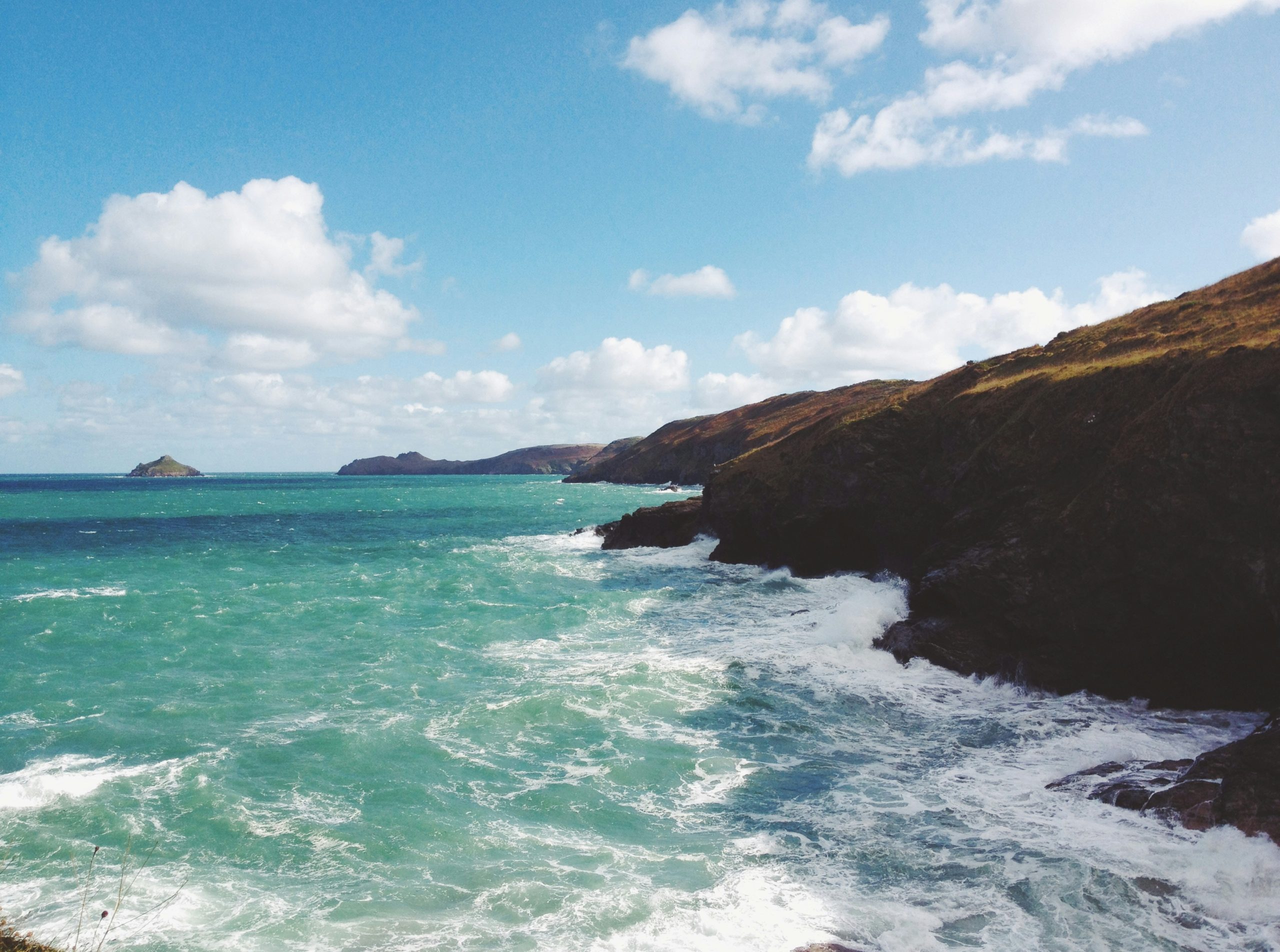 ocean near mountain