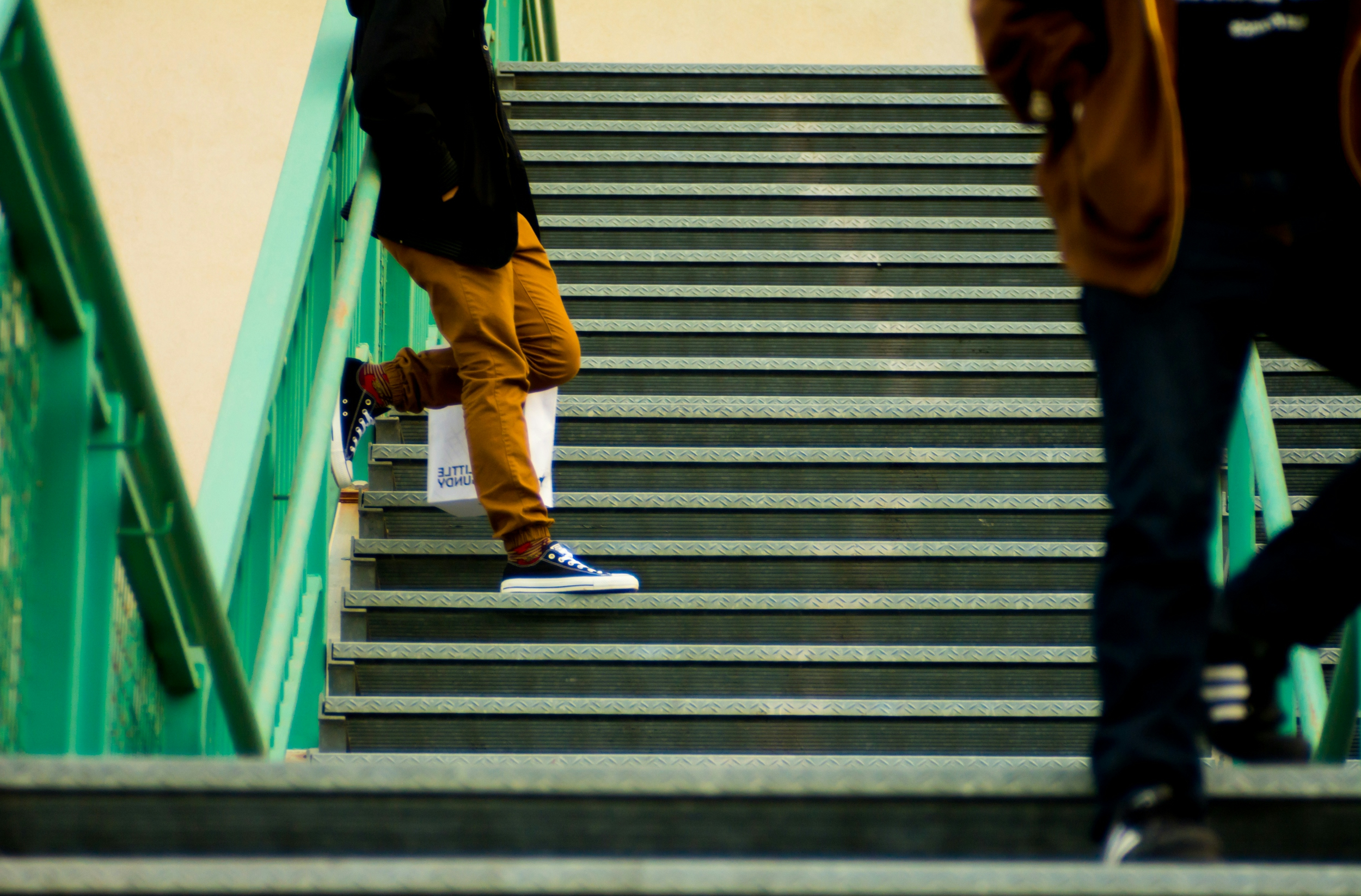 person standing on stairs